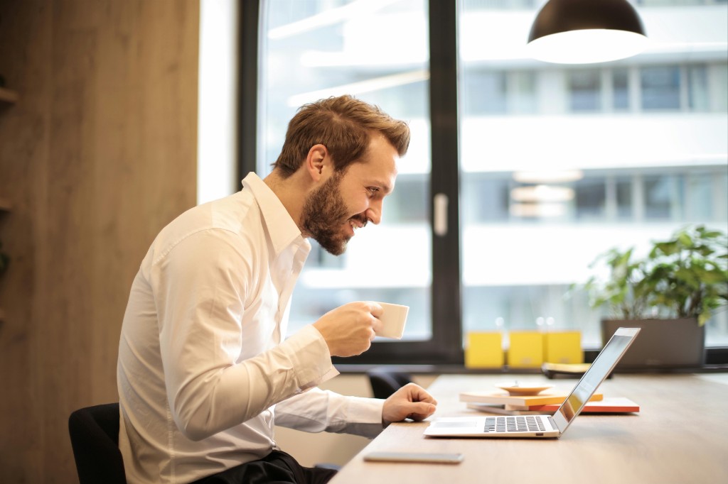 Business owner running 24-7 Publisher from a laptop