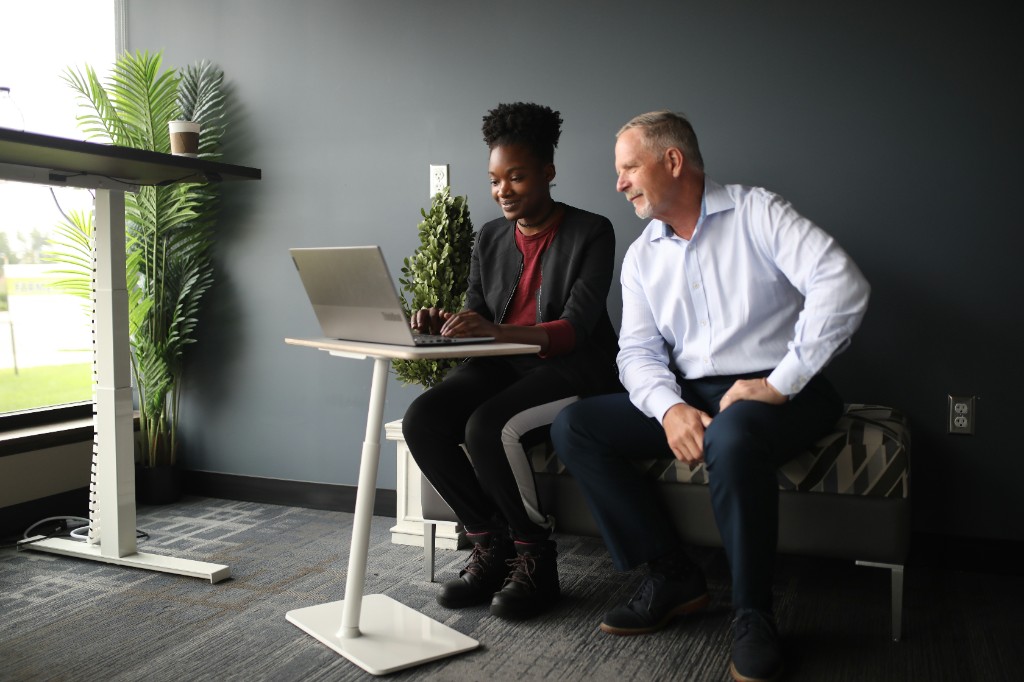 Consultant and business owner reviewing their automation plan together