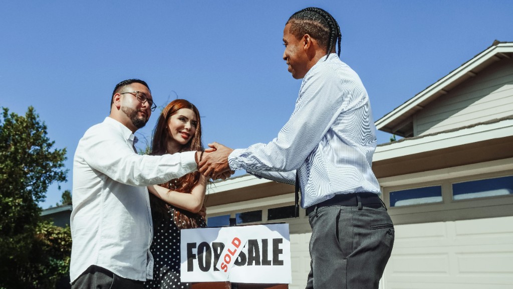 Real estate agents reviewing lead automation system